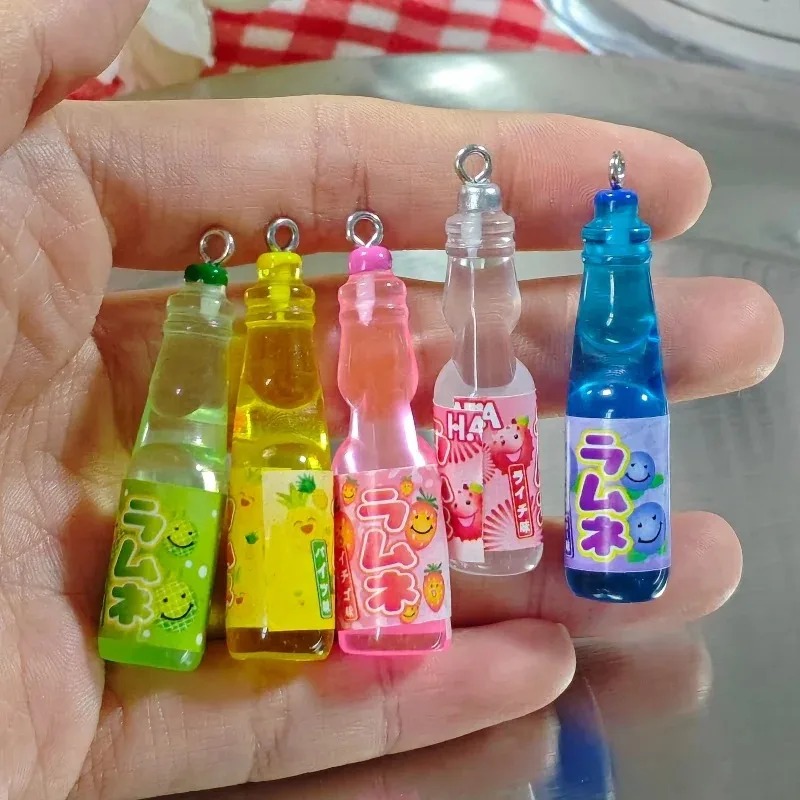 Resin Art Notes - 10 قطع من الحلي الراتنجية على